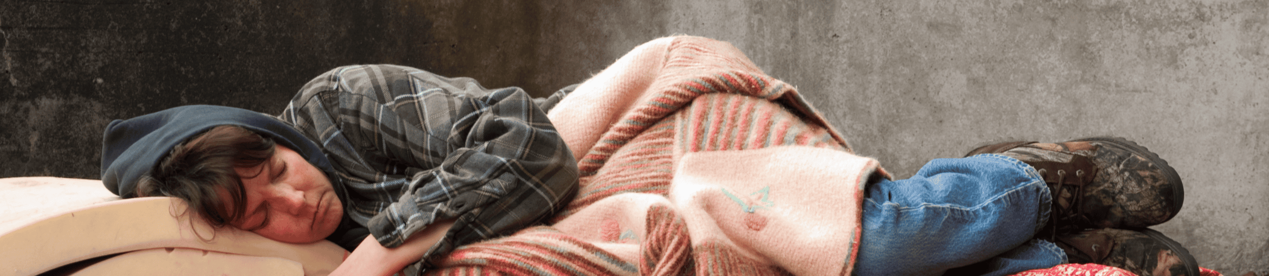 Homeless woman sleeping